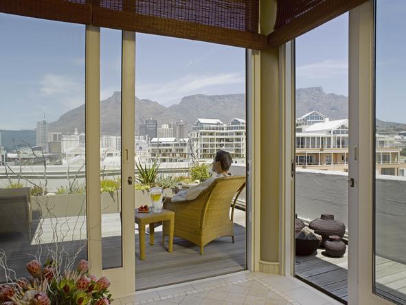 Cape Grace - guest on balcony